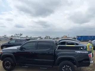 2023 Toyota Tacoma SR z VIN 3TMCZ5AN4PM548729, wystawiony jako IAAI lot #42078723 z przebiegiem 30 966 mil mil oraz . Historia ofert i sprzedaży dostępna na DreamBid. Obrazek 13.