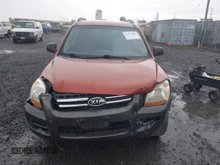 2006 Kia Sportage LX with VIN KNDJE723167159809, listed as a IAAI auction lot 41974464 with 130,822 mi miles and . Bid and sale history available at DreamBid. Image 12.
