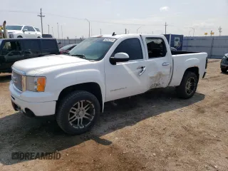2011 GMC Sierra 1500 Denali z VIN 3GTP2XE2XBG319593, wystawiony jako Copart lot #62852514 z przebiegiem 128 287 mil mil oraz Szkody całkowita. Historia ofert i sprzedaży dostępna na DreamBid. Obrazek 1.