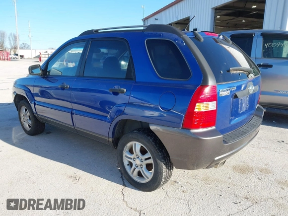 2005 Kia Sportage LX with VIN KNDJF723157097517, listed as a IAAI auction lot 41485759 with 207,294 mi miles and . Bid and sale history available at carsss.com. Image 3.