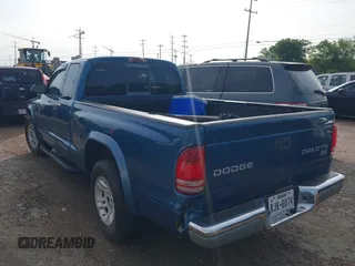 2003 Dodge Dakota SLT with VIN 1D7HL42N93S196397, listed as a IAAI auction lot 42105857 with 159,690 mi miles. Bid and sale history available at carsss.com. Image 3.