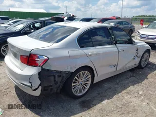 2013 BMW 3 Series 328i z VIN WBA3A5C51DJ461736, wystawiony jako IAAI lot #42662559 z przebiegiem 152 985 mil mil oraz . Historia ofert i sprzedaży dostępna na DreamBid. Obrazek 4.