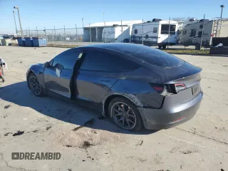 2023 Tesla Model 3 with VIN 5YJ3E1EA6PF713275, listed as a Copart auction lot 41683315 with 26,463 mi miles and Salvage Title. Bid and sale history available at DreamBid. Image 2.