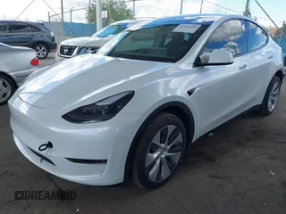 2024 Tesla Model Y Long Range with VIN 7SAYGDEE5RA222333, listed as a IAAI auction lot 41944404 with 12,176 mi miles. Bid and sale history available at carsss.com. Image 23.