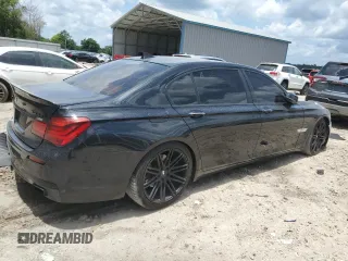 2014 BMW 7 Series 740Li with VIN WBAYE4C53ED137952, listed as a Copart auction lot 62829515 with 151,160 mi miles and Salvage title. Bid and sale history available at DreamBid. Image 3.