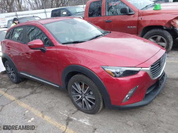2018 Mazda CX-3 Grand Touring with VIN JM1DKFD75J0305565, listed as a IAAI auction lot 41135957 with 26,810 mi miles. Bid and sale history available at carsss.com. Image 1.