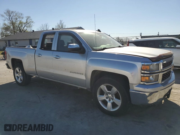 2015 Chevrolet Silverado 1500 LS with VIN 1GCRCPEH1FZ335827, listed as a Copart auction lot 50414585 with 214,079 mi miles and Salvage Title. Bid and sale history available at DreamBid. Image 4.