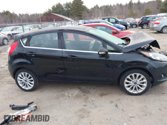 2017 Ford Fiesta Titanium with VIN 3FADP4FJ6HM112434, listed as a IAAI auction lot 41803424 with Not Provided miles and . Bid and sale history available at DreamBid. Image 13.