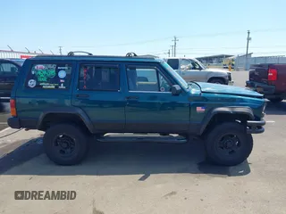 1995 Jeep Cherokee Sport with VIN 1J4FJ68S7SL631078, listed as a IAAI auction lot 42408148 with 190,765 mi miles and . Bid and sale history available at DreamBid. Image 13.