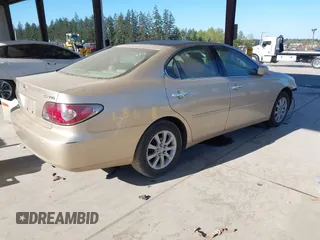 2004 Lexus ES 330 with VIN JTHBA30G340003869, listed as a IAAI auction lot 42024907 with 240,425 mi miles. Bid and sale history available at carsss.com. Image 4.