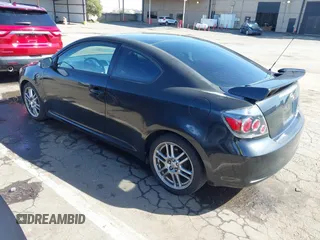 2009 Scion tC with VIN JTKDE167090284572, listed as a IAAI auction lot 41808769 with 132,474 mi miles. Bid and sale history available at carsss.com. Image 3.