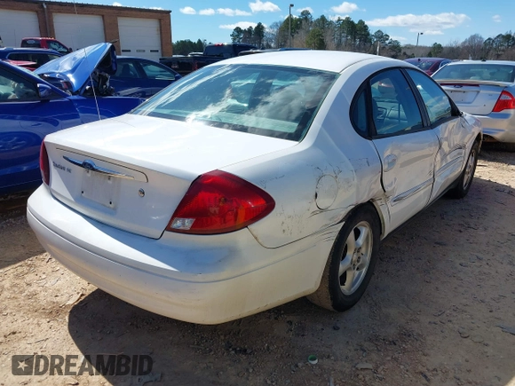 2003 Ford Taurus SE Standard with VIN 1FAFP53223A203718, listed as a IAAI auction lot 41708811 with 200,413 mi miles. Bid and sale history available at carsss.com. Image 4.