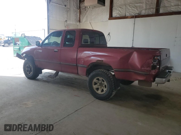 1997 Toyota T100 DX with VIN JT4UN22DXV0038731, listed as a Copart auction lot 52185665 with 268,281 mi miles and Salvage Title. Bid and sale history available at carsss.com. Image 2.