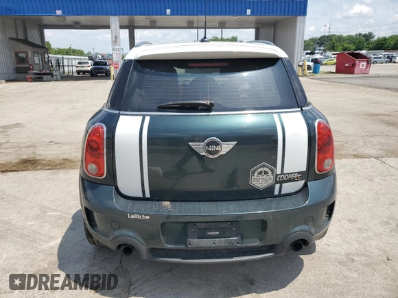 2013 MINI Countryman S with VIN WMWZC3C58DWP21965, listed as a Copart auction lot 61161735 with 142,797 mi miles and Salvage title. Bid and sale history available at DreamBid. Image 6.