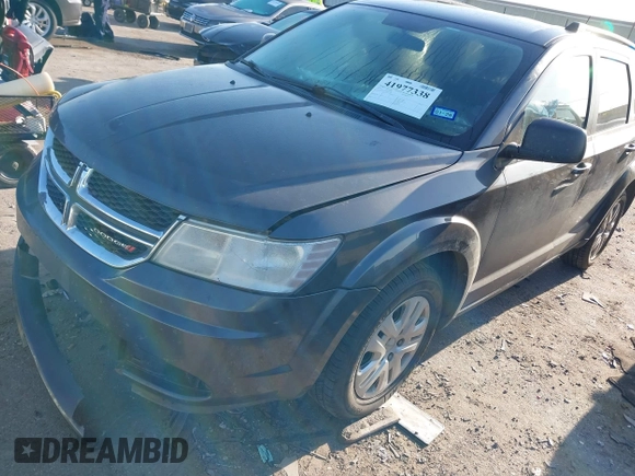 2017 Dodge Journey SE z VIN 3C4PDCAB9HT551840, wystawiony jako IAAI lot #41977338 z przebiegiem 202 856 mil mil oraz . Historia ofert i sprzedaży dostępna na DreamBid. Obrazek 2.