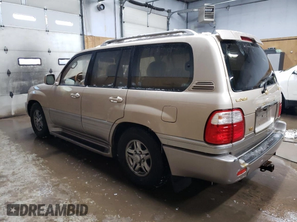 2001 Lexus LX 470 z VIN JTJHT00W213507042, wystawiony jako Copart lot #84236804 z przebiegiem 179 706 mil mil oraz Tytuł czysty. Historia ofert i sprzedaży dostępna na DreamBid. Obrazek 2.
