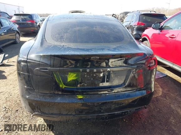 2014 Tesla Model S 60 with VIN 5YJSA1H1XEFP34226, listed as a IAAI auction lot 41806604 with 216,021 mi miles and . Bid and sale history available at DreamBid. Image 16.