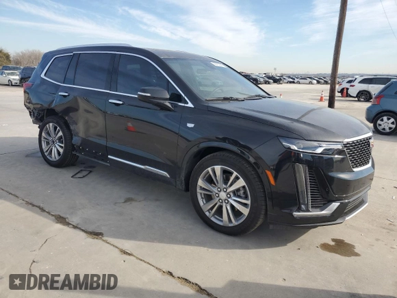 2024 Cadillac XT6 FWD Premium Luxury with VIN 1GYKPCRS7RZ710803, listed as a Copart auction lot 88152345 with 10,409 mi miles and Salvage Title. Bid and sale history available at carsss.com. Image 4.