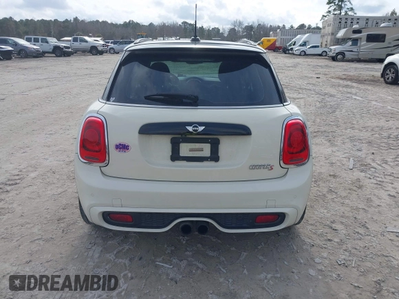 2017 MINI Hardtop 4 Door Cooper S z VIN WMWXU3C54H2D32602, wystawiony jako IAAI lot #41458333 z przebiegiem 124 235 mil mil oraz . Historia ofert i sprzedaży dostępna na DreamBid. Obrazek 16.