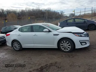 2015 Kia Optima EX with VIN 5XXGN4A73FG438313, listed as a IAAI auction lot 41699954 with 76,584 mi miles. Bid and sale history available at carsss.com. Image 12.
