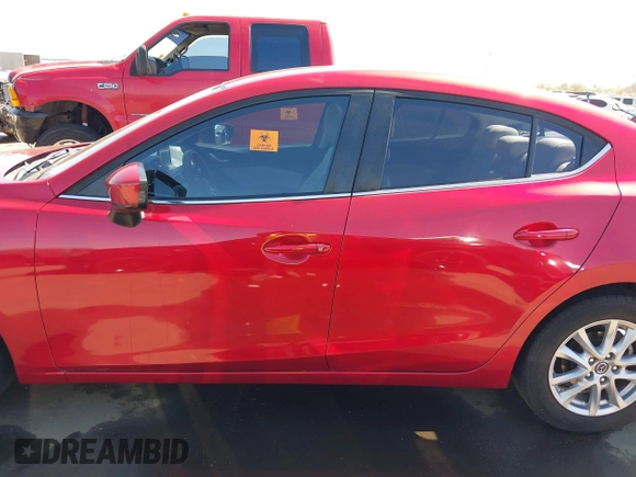2016 Mazda Mazda3 i Sport with VIN JM1BM1U71G1345696, listed as a IAAI auction lot 41845701 with 141,646 mi miles. Bid and sale history available at carsss.com. Image 14.