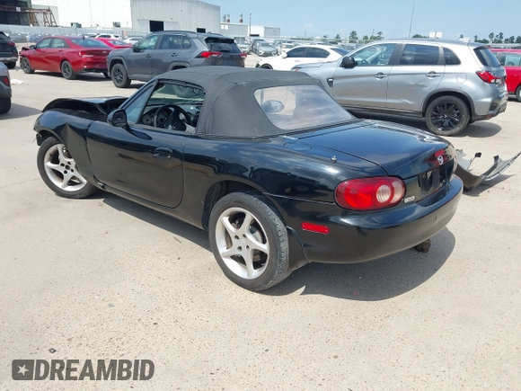 2002 Mazda MX-5 Miata Cloth with VIN JM1NB353520221312, listed as a IAAI auction lot 42410028 with 99,375 mi miles and . Bid and sale history available at DreamBid. Image 3.