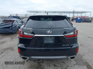 2016 Lexus RX 350 z VIN 2T2BZMCA4GC017342, wystawiony jako IAAI lot #42357093 z przebiegiem 142 515 mil mil oraz . Historia ofert i sprzedaży dostępna na DreamBid. Obrazek 16.