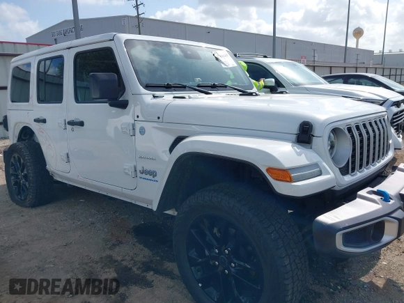 2024 Jeep Wrangler Sahara z VIN 1C4RJXP6XRW249035, wystawiony jako IAAI lot #42441640 z przebiegiem 34 128 mil mil oraz . Historia ofert i sprzedaży dostępna na DreamBid. Obrazek 1.