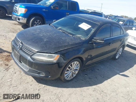 2013 Volkswagen Jetta TDI w/Premium/Nav with VIN 3VWLL7AJ8DM285616, listed as a IAAI auction lot 41597180 with 197,150 mi miles and . Bid and sale history available at DreamBid. Image 2.
