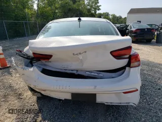 2023 Kia Rio S with VIN 3KPA24AD3PE597752, listed as a Copart auction lot 64836674 with 8,434 mi miles and Salvage Title. Bid and sale history available at carsss.com. Image 6.