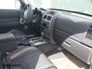 2011 Dodge Nitro SE with VIN 1D4PU2GKXBW508467, listed as a IAAI auction lot 42061484 with 100,295 mi miles. Bid and sale history available at carsss.com. Image 5.