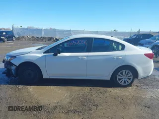2020 Subaru Impreza with VIN 4S3GKAB64L3604900, listed as a IAAI auction lot 41652056 with 39,656 mi miles and . Bid and sale history available at DreamBid. Image 14.