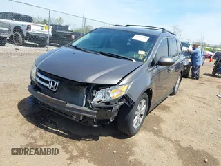 2016 Honda Odyssey SE with VIN 5FNRL5H34GB043343, listed as a IAAI auction lot 42096360 with 140,878 mi miles and . Bid and sale history available at DreamBid. Image 2.