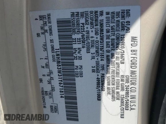 2001 Lincoln Town Car Cartier z VIN 1LNHM83W31Y671814, wystawiony jako Copart lot #77169664 z przebiegiem Nie podano mil oraz Szkoda całkowita • Salvage title. Historia ofert i sprzedaży dostępna na DreamBid. Obrazek 13.