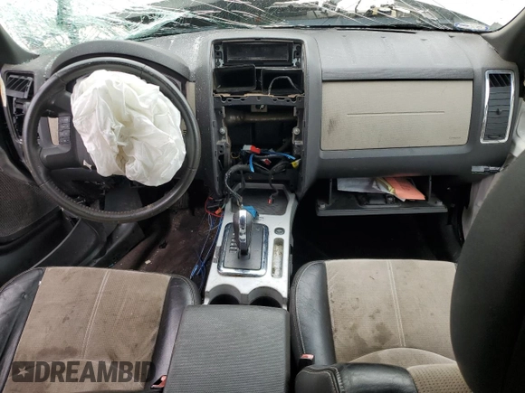 2011 Mercury Mariner Premier с VIN 4M2CN8H74BKJ04765, выставлен на аукционе Copart как лот 45813985 с пробегом Не указан миль и Списание • Salvage title. История ставок и продаж доступна на DreamBid. Изображение 8.