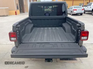 2023 Jeep Gladiator Sport S с VIN 1C6HJTAG6PL560425, выставлен на аукционе Copart как лот 67550135 с пробегом 16 967 миль миль и Чистый • Clean title. История ставок и продаж доступна на DreamBid. Изображение 12.