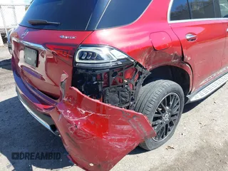 2020 Mercedes-Benz GLE 450 z VIN 4JGFB5KBXLA164494, wystawiony jako IAAI lot #42112215 z przebiegiem 30 868 mil mil oraz . Historia ofert i sprzedaży dostępna na DreamBid. Obrazek 6.