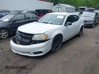 2014 Dodge Avenger SE with VIN 1C3CDZAB0EN148086, listed as a IAAI auction lot 42234364 with 200,650 mi miles and . Bid and sale history available at DreamBid. Image 2.