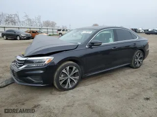 2022 Volkswagen Passat 2.0T SE with VIN 1VWSA7A39NC000413, listed as a Copart auction lot 47792405 with 51,677 mi miles and Salvage Title. Bid and sale history available at carsss.com. Image 1.