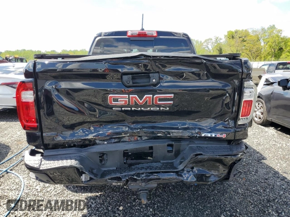2023 GMC Canyon 4WD AT4 with VIN 1GTP6DEK9P1151776, listed as a Copart auction lot 52977805 with 11,750 mi miles and Salvage Title. Bid and sale history available at carsss.com. Image 6.