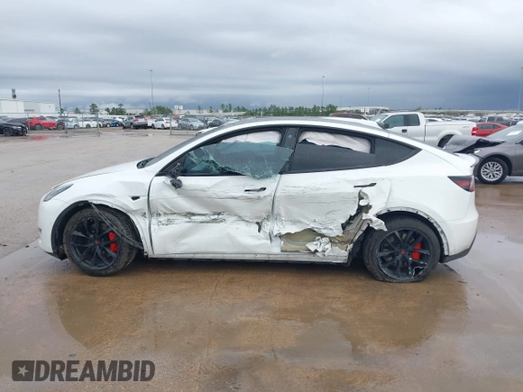2022 Tesla Model Y Performance with VIN 7SAYGDEF1NF456829, listed as a IAAI auction lot 41448425 with 41,380 mi miles and . Bid and sale history available at DreamBid. Image 13.