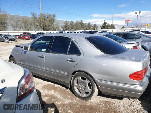 1998 Mercedes-Benz E with VIN WDBJF70F7WA605103, listed as a Copart auction lot 42458545 with 189,082 mi miles and Salvage Title. Bid and sale history available at DreamBid. Image 2.