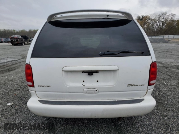 2000 Dodge Caravan SE z VIN 1B4GP44G1YB736936, wystawiony jako Copart lot #49718495 z przebiegiem Nie podano mil oraz Szkoda całkowita • Salvage title. Historia ofert i sprzedaży dostępna na DreamBid. Obrazek 6.