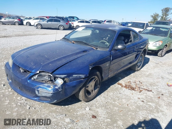 1996 Ford Mustang with VIN 1FALP4042TF140884, listed as a IAAI auction lot 41279611 with 233,047 mi miles. Bid and sale history available at carsss.com. Image 2.