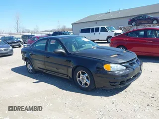 2004 Pontiac Grand Am GT with VIN 1G2NW52E74M683389, listed as a IAAI auction lot 41810159 with 227,091 mi miles. Bid and sale history available at carsss.com. Image 1.