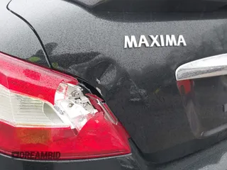 2011 Nissan Maxima S with VIN 1N4AA5AP0BC866153, listed as a IAAI auction lot 41956111 with 244,557 mi miles and . Bid and sale history available at DreamBid. Image 13.