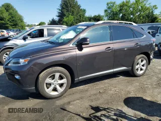 2015 Lexus RX 350 with VIN JTJBK1BAXF2470299, listed as a Copart auction lot 61242875 with 125,328 mi miles and Salvage title. Bid and sale history available at DreamBid. Image 1.