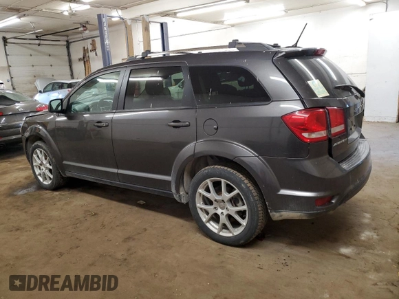 2015 Dodge Journey SXT with VIN 3C4PDCCG9FT722284, listed as a Copart auction lot 84937724 with 210,747 mi miles and Salvage title. Bid and sale history available at DreamBid. Image 2.