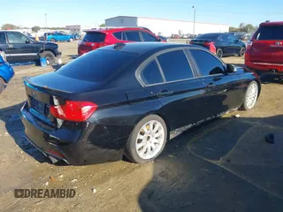2013 BMW 3 Series 328i with VIN WBA3A5G5XDNP25605, listed as a IAAI auction lot 40854040 with 155,511 mi miles. Bid and sale history available at carsss.com. Image 4.
