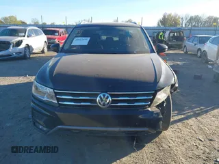 2018 Volkswagen Tiguan SEL with VIN 3VV3B7AX7JM117053, listed as a IAAI auction lot 40827695 with 71,489 mi miles and . Bid and sale history available at DreamBid. Image 12.
